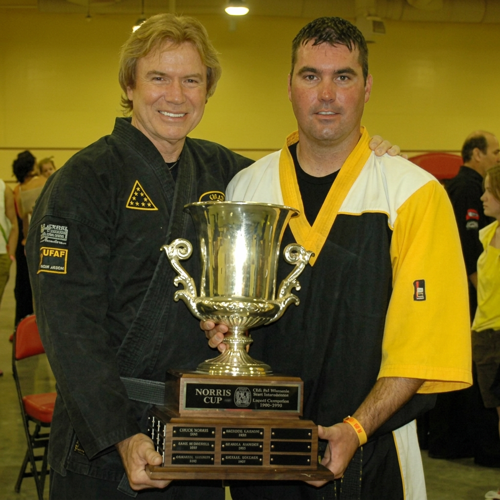 Steve Giroux with Chuck Norris and the Norris Cup